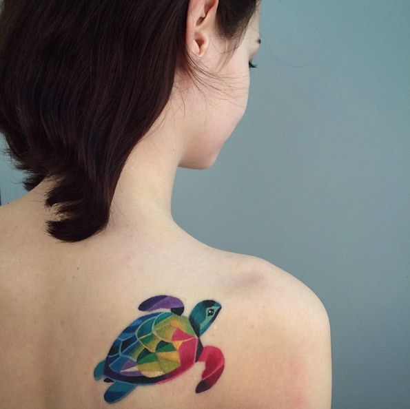 Colorful sea turtle on back shoulder by Sasha Unisex