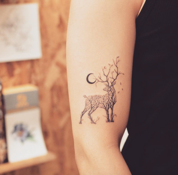 Tree-themed deer tattoo by Grain