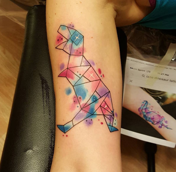 Geometric watercolor t-rex tattoo by Rich Nelson