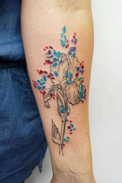 Abstract flower tattoo on forearm by Aline Wata