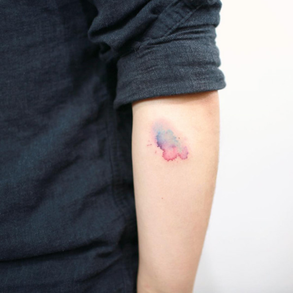 Watercolor smudge tattoo by Doy