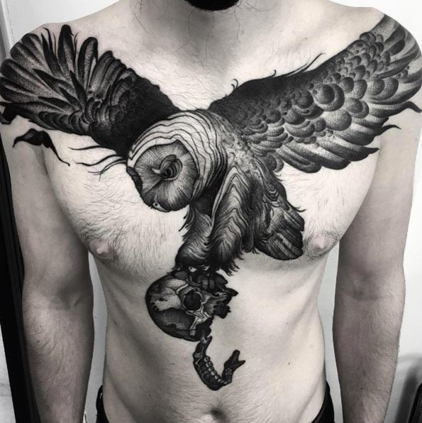 Outstanding owl tattoo on chest by Kelly Violet