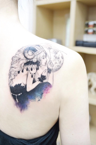 Aries girl tattoo on back shoulder by Banul