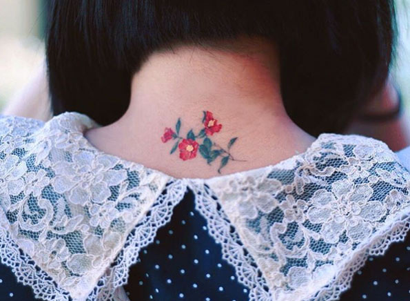 Back neck floral piece by Sol Art