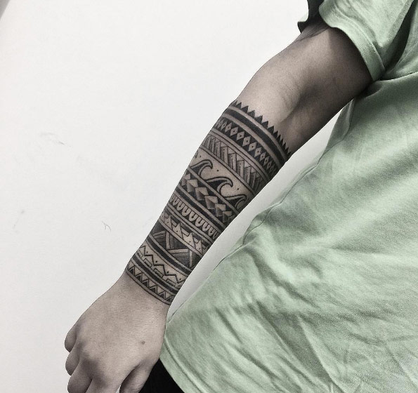 Banded tribal sleeve tattoo by Gabriel Chapel