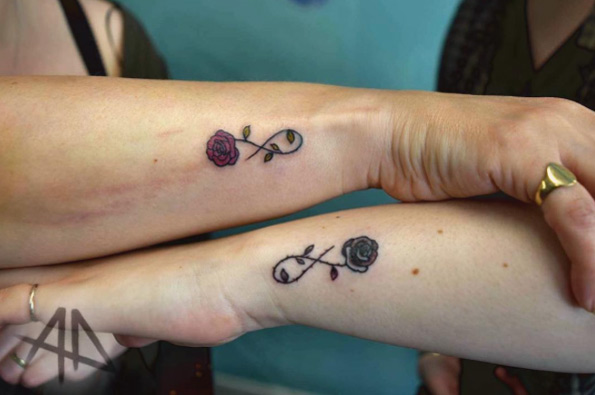 Tiny infinity rose tattoos by Aiden Donnellan