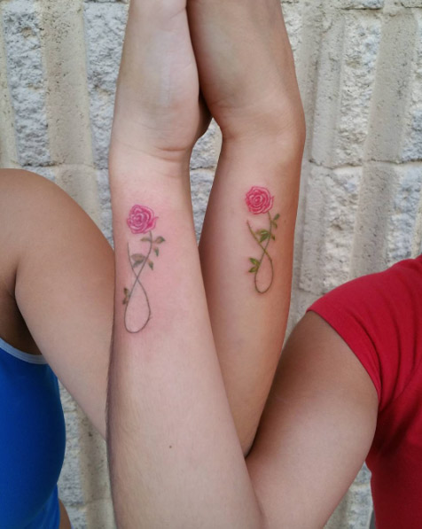 Infinity rose tattoos by Carlos Vazquez