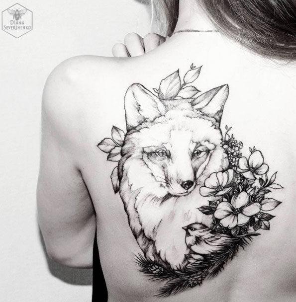 Stunning blackwork fox and florals on back shoulder by Diana Severinenko