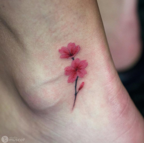 Cherry blossoms on ankle by Eiji