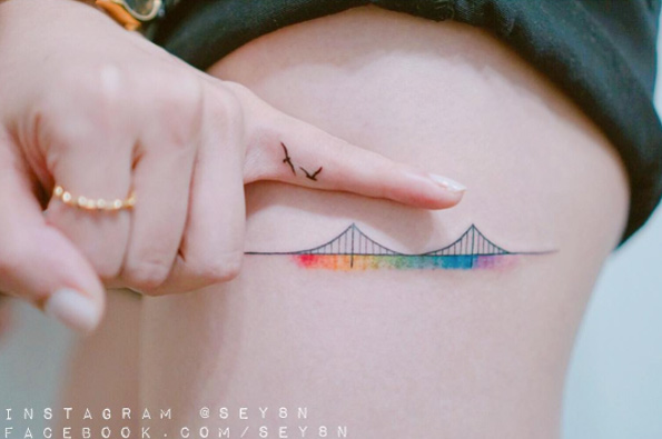 Colorful bridge tattoo by Seyoon Gim