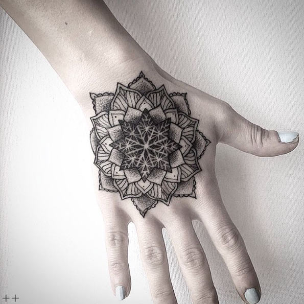 Dotwork mandala tattoo on hand by Octavio Camino