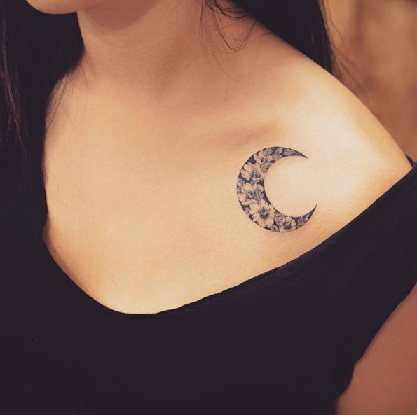 Elegant floral moon tattoo by Grain