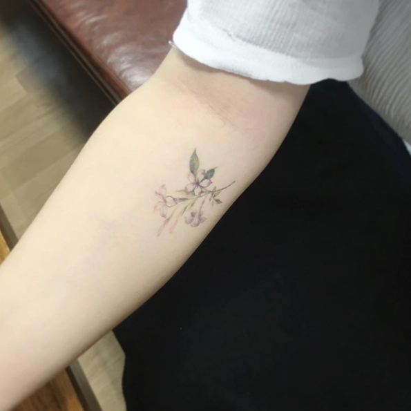 Faint flowers by Tattooist Flower