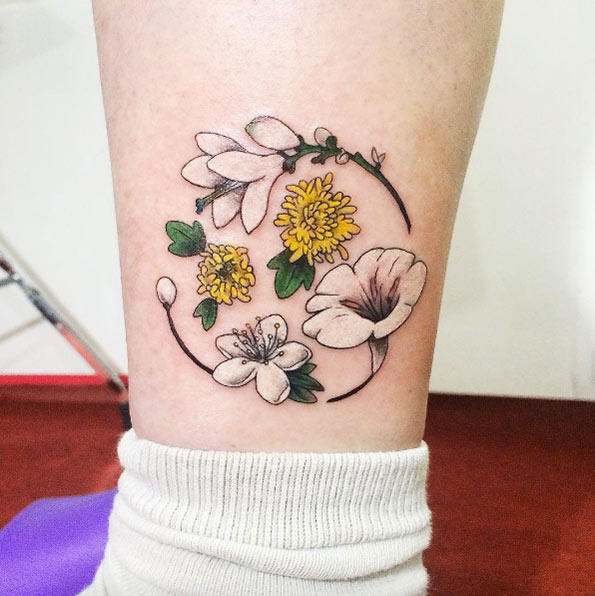Floral ankle tattoo by Zihee