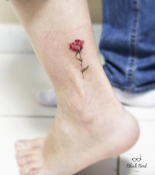 Beautiful floral ankle tattoo by Luiza Oliveira