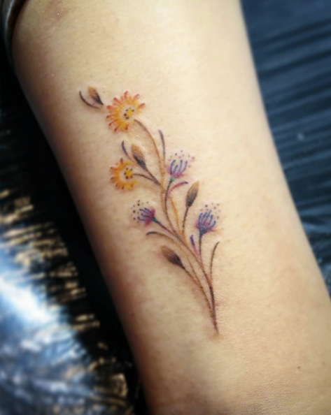 Flowers on ankle by Holly Walsh