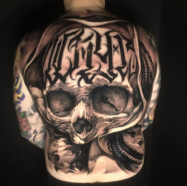 Large skull on back by Benjamin Laukis