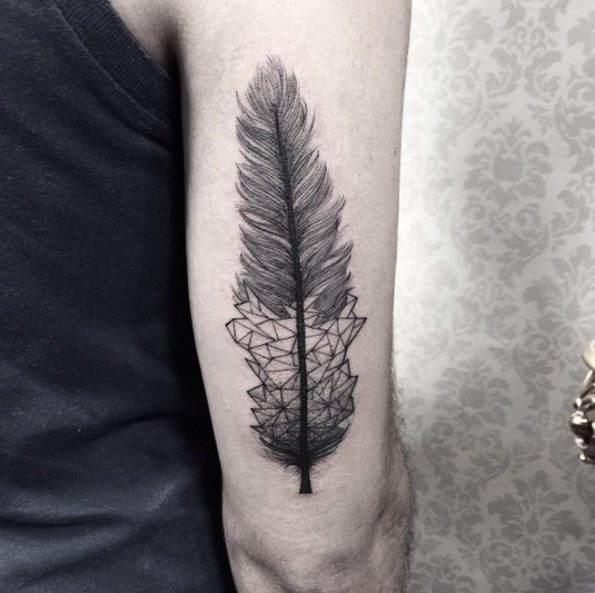 Geometric feather tattoo by Sandra Cunha