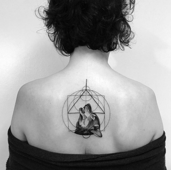 Geometric wolf tattoo on back by Daniel Matsumoto