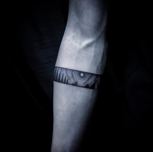 Landscape armband tattoo by Clifford Wong