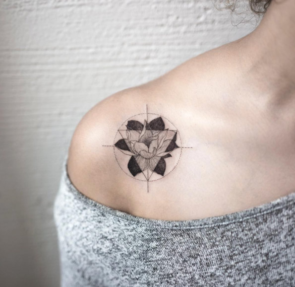 Abstract lotus flower tattoo on shoulder by Hongdam
