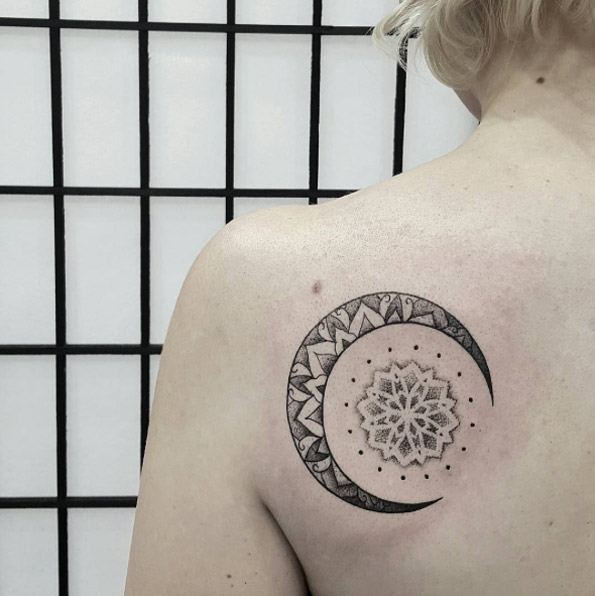 Mandala-infused crescent moon tattoo by Ben Doukakis