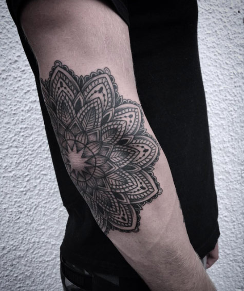Mandala flower on elbow by Laura Weller