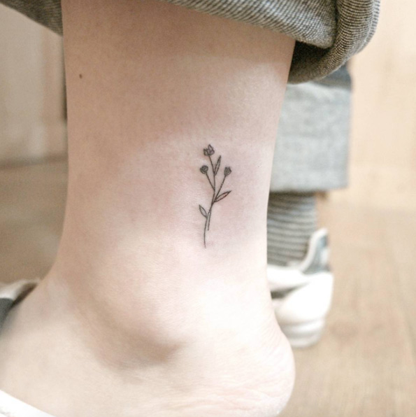 Mini florals on ankle by Chaewa