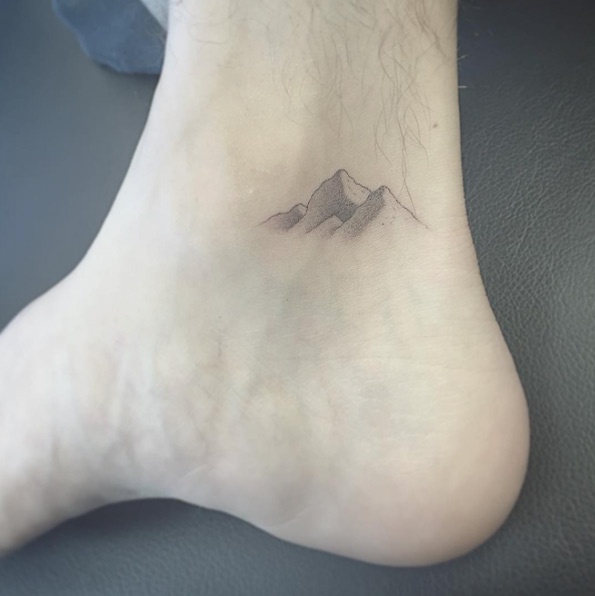 Tiny mountain range on ankle by East Iz