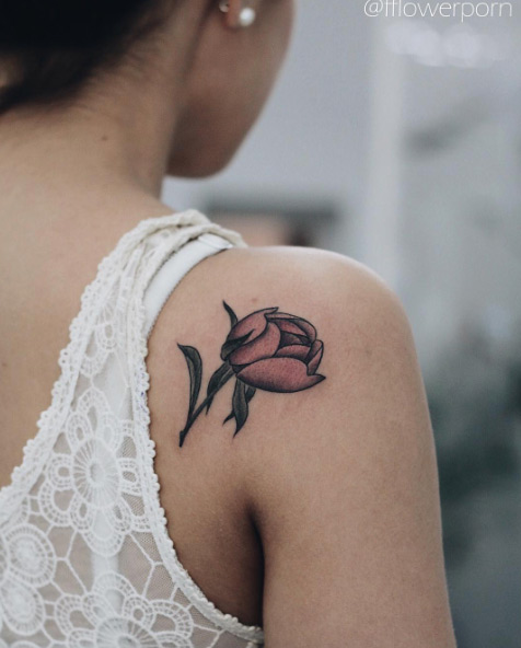 Soft peony bud tattoo by Olga Nekrasova