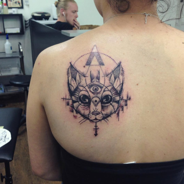 Sketched cat tattoo on back shoulder by Cynthia Sobraty