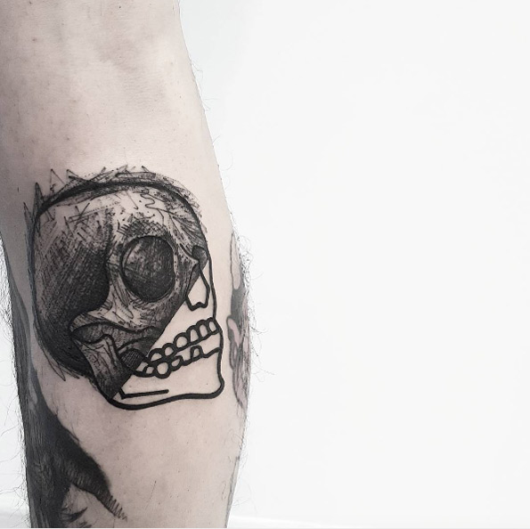 Half-sketched skull tattoo by Matteo Nangeroni
