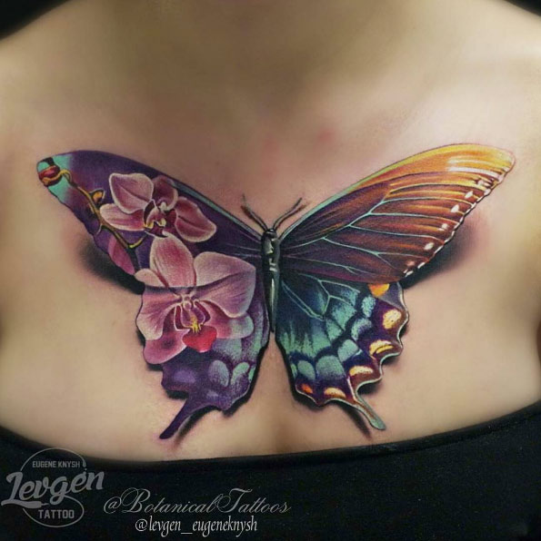 Stunning butterfly tattoo on chest by Levgen