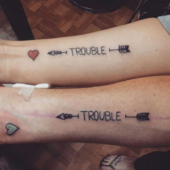 Trouble best friend arrow tattoos by Kelley Goodwin