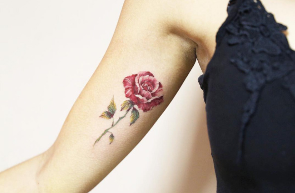 Underarm rose tattoo by Luiza Oliveira