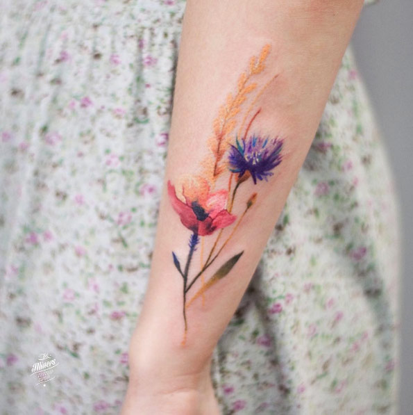 Watercolor floral tattoo by Magdalena Bujak