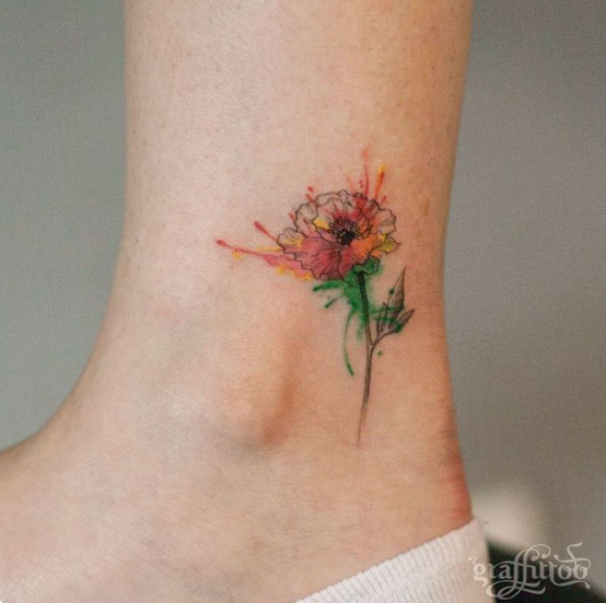 Watercolor poppy tattoo on ankle by Tattooist River