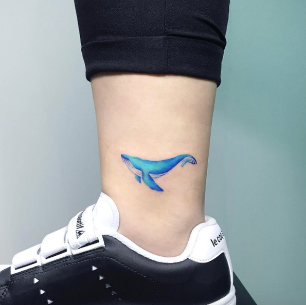 Whale tattoo on ankle by IDA