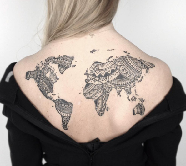 Interesting world map tattoo by Jakub Nowicz