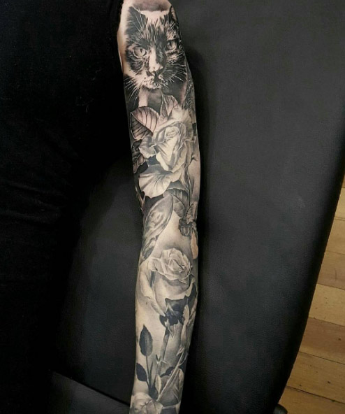 Stunning hyper-realistic floral sleeve by Mrs Campbell