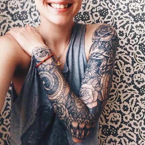 Black and grey ink full sleeve tattoo via Shaka Brah