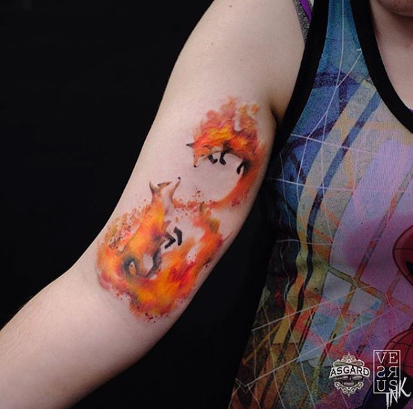Amazing watercolor fox tattoo by Alberto Cuerva