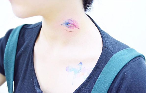 Watercolor lips tattoo by Tattooist Baul