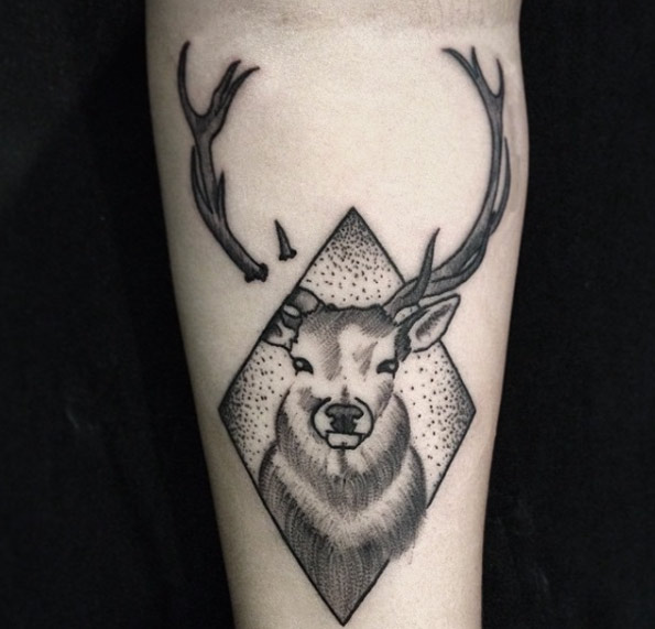 Pierced skin stag tattoo by Felipe Mello