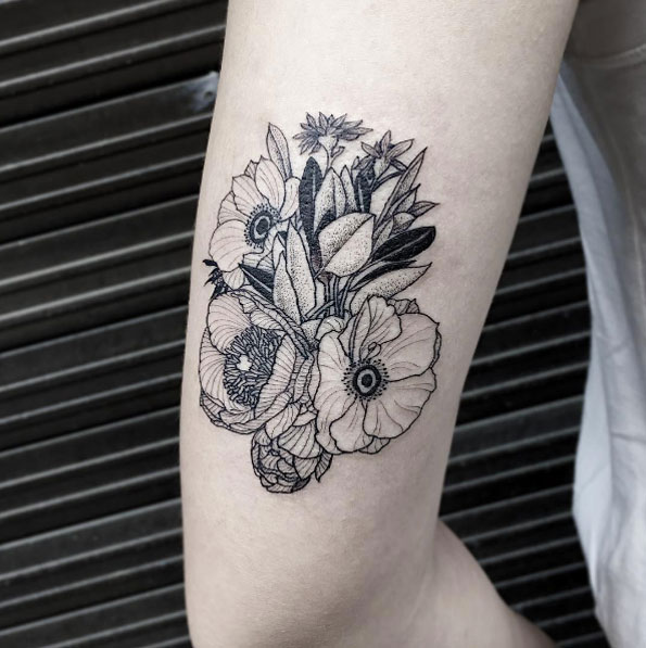 Blackwork bouquet on back arm by Oozy
