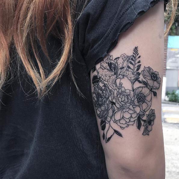 Blackwork back arm floral bouquet by Oozy