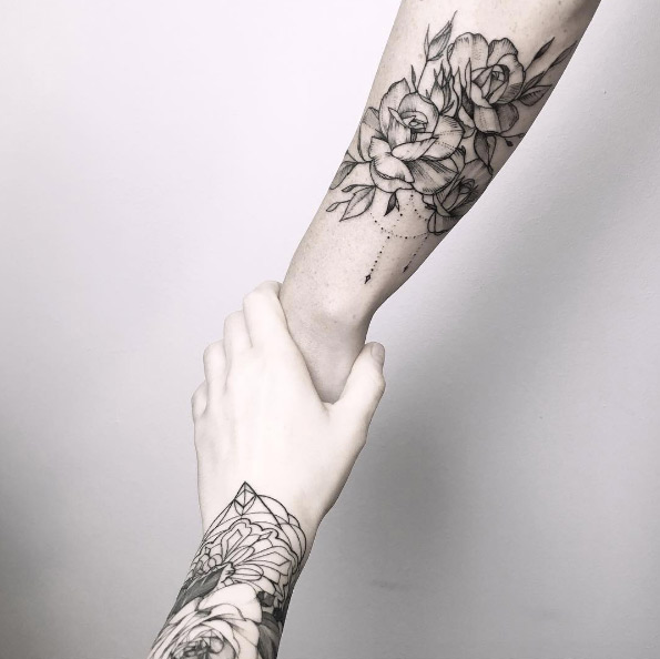 Blackwork roses on forearm by Maria Fernandez