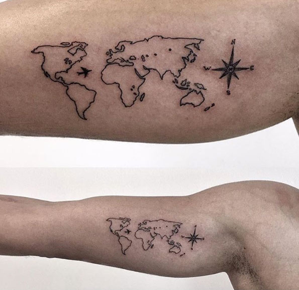 Blackwork travel tattoo on bicep via Johnny Ward