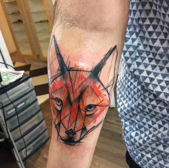 Colorful sketch style fox tattoo by Kamil Mokot