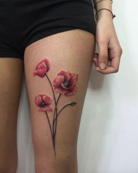 Poppies on thigh by Jess